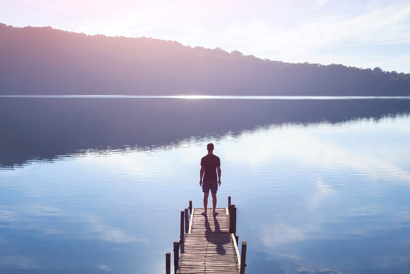 human strength or psychology concept, man standing on pier