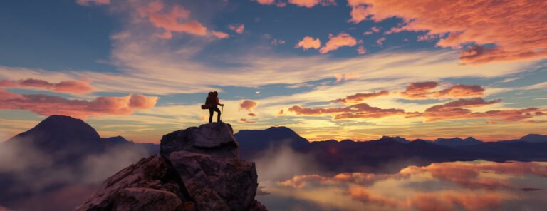 Adventure Woman Hiker Standing on a peak. Mountain Landscape in Background. Dramatic Sunset.