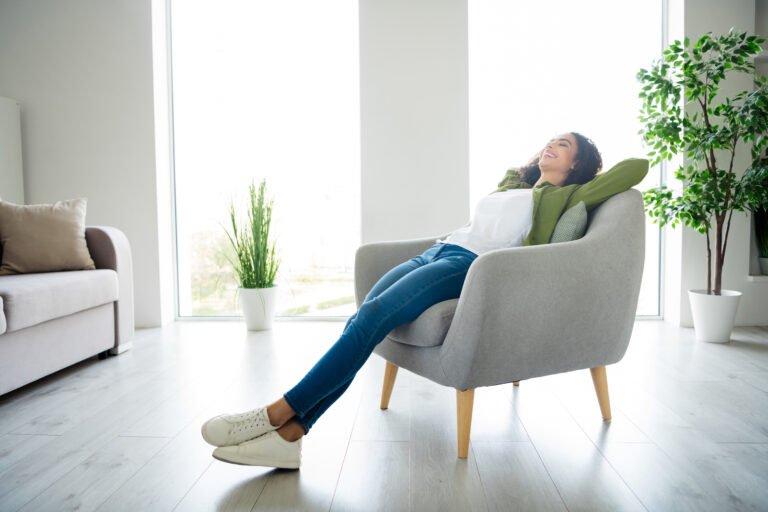 Photo of a dreamy cute girl wear khaki stylish clothes comfortable apartment flat living room daylight indoors