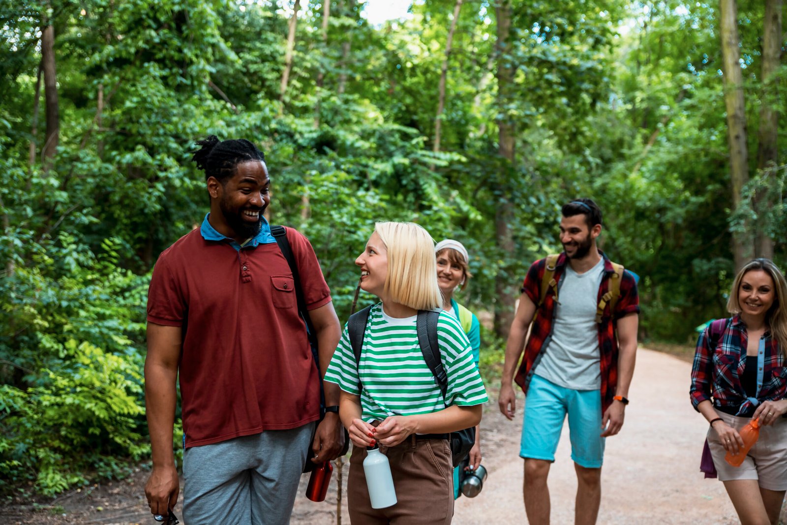 Happy People in the forest walk
