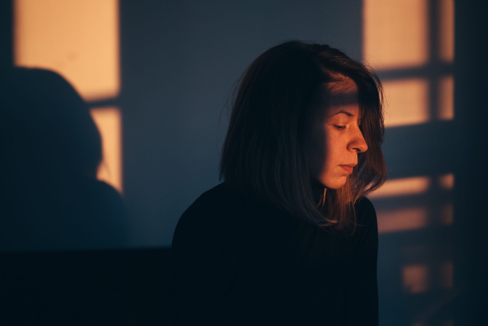 Woman sitting alone and depressed