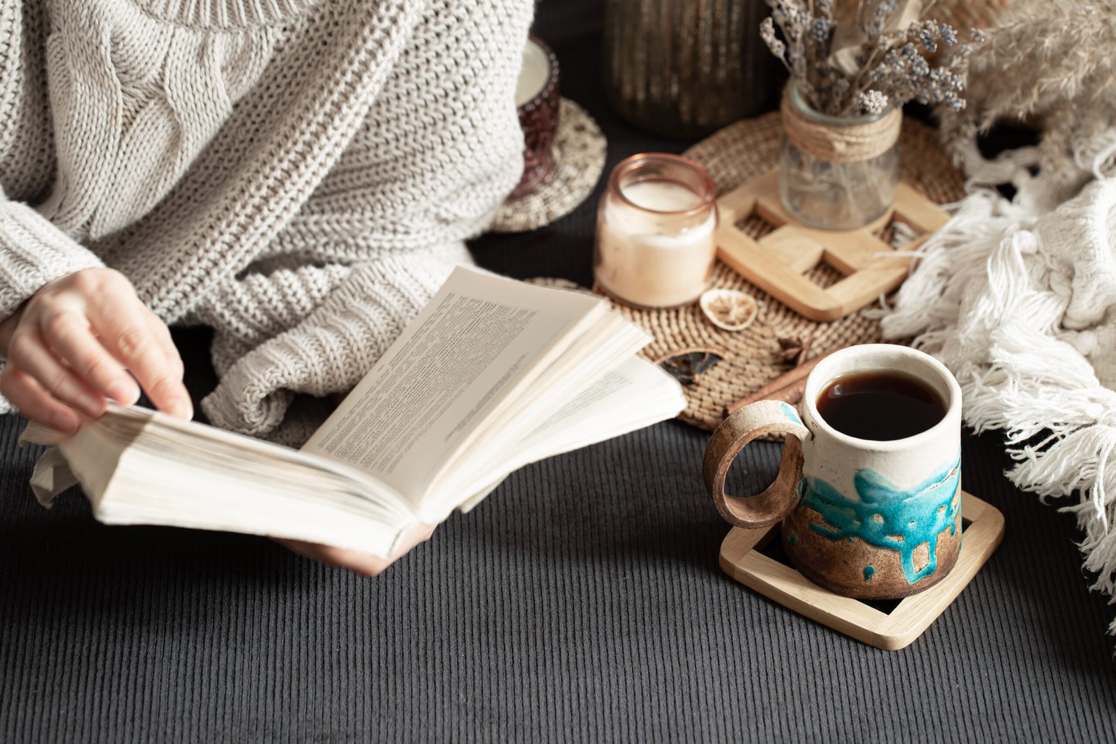 Still life with a beautiful Cup and female hands.