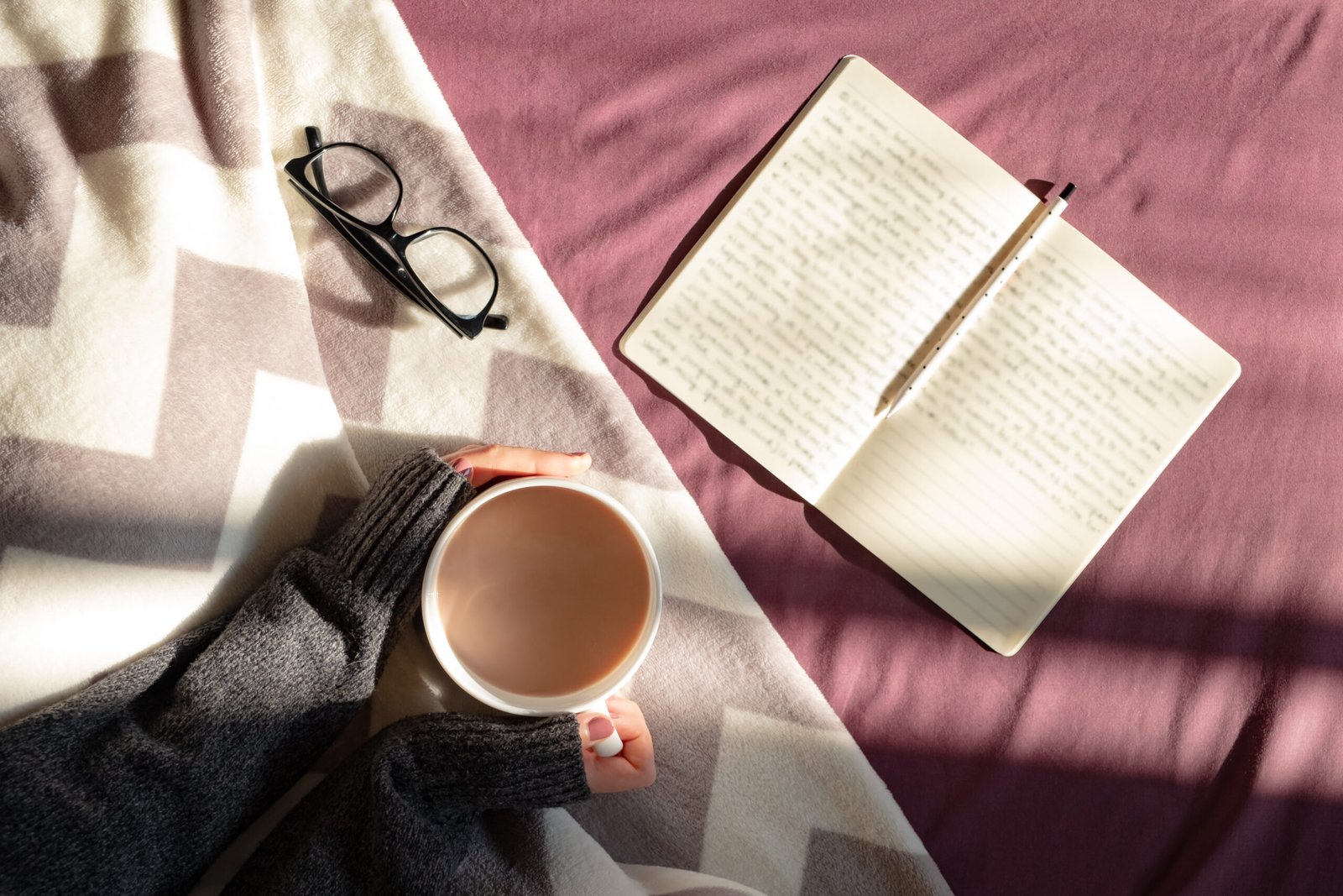 Having coffee and reading in bed on lazy sunny morning.