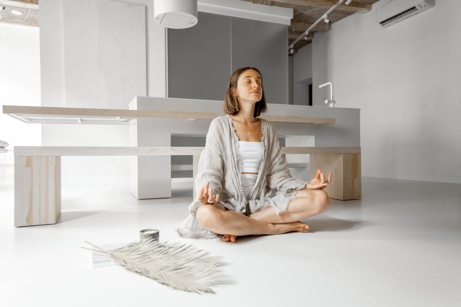 Woman meditating at home