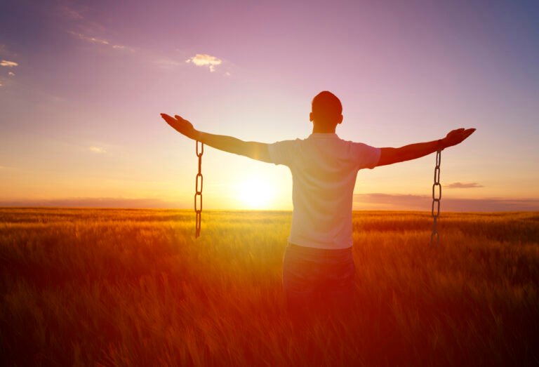 Man feeling free in a beautiful natural setting.