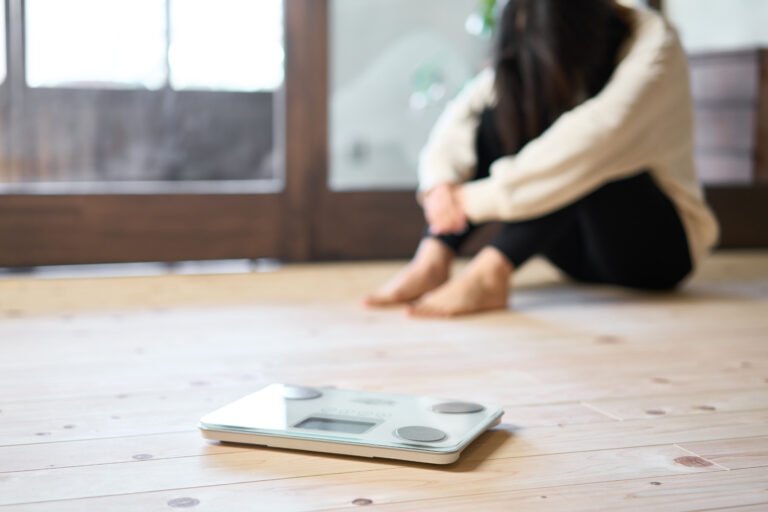 Asian woman frustrated by diet