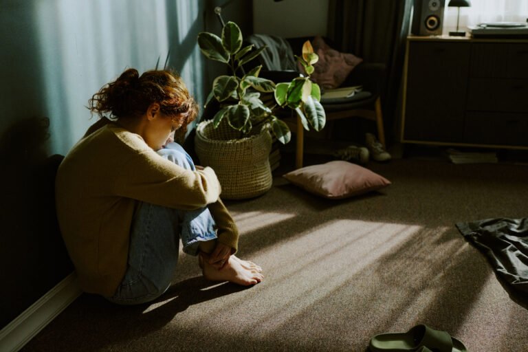 Reflecting While Sitting on Floor in Natural Light
