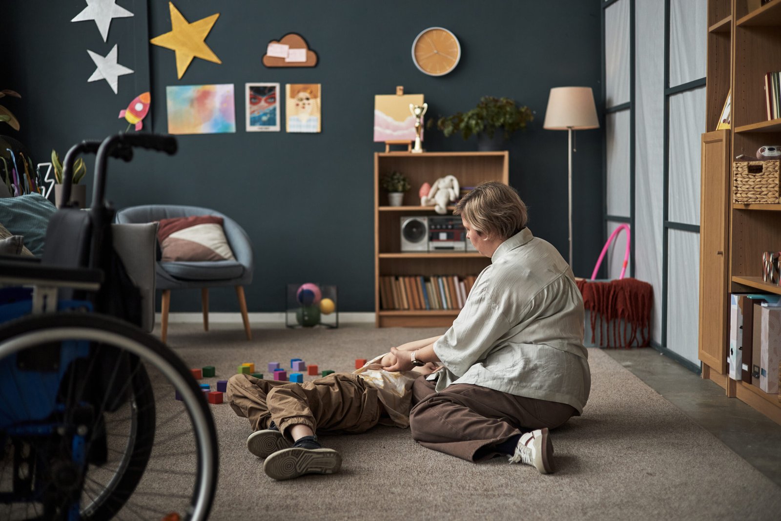 Caring and Playing with Child with Disability in Cozy Living Room